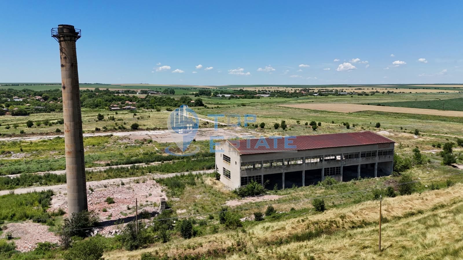 Промишлен имот с 57 дка парцел, промишлени сгради и подстанция в с. Овча могила, община Свищов - 0