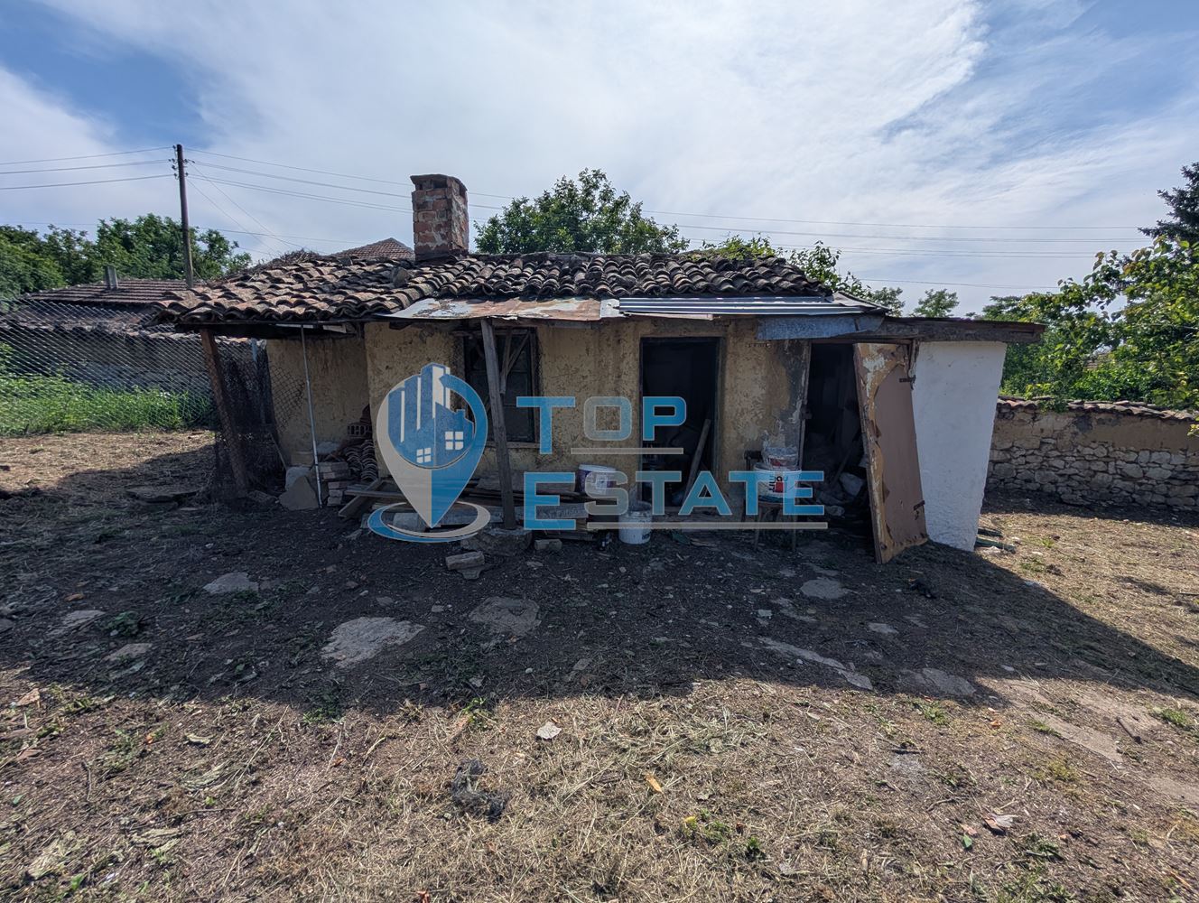 Едноетажна реновирана тухлена къща с голям двор в село Русаля - 0