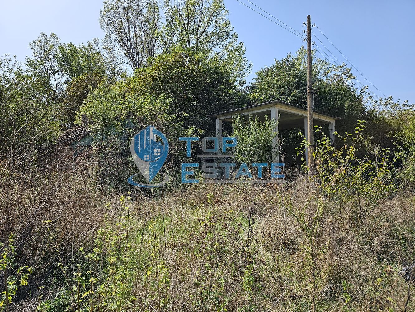 Промишлен имот с огромен парцел с трафопост в село Садина-0 Промишлен имот с огромен парцел с трафопост в село Садина - 0