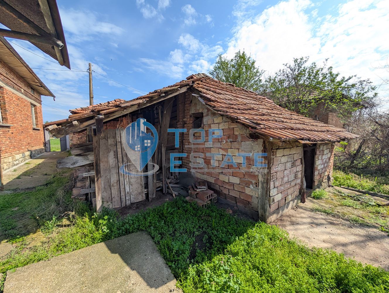 Едноетажна тухлена къща с гараж в село Павел-0 Едноетажна тухлена къща с гараж в село Павел - 0