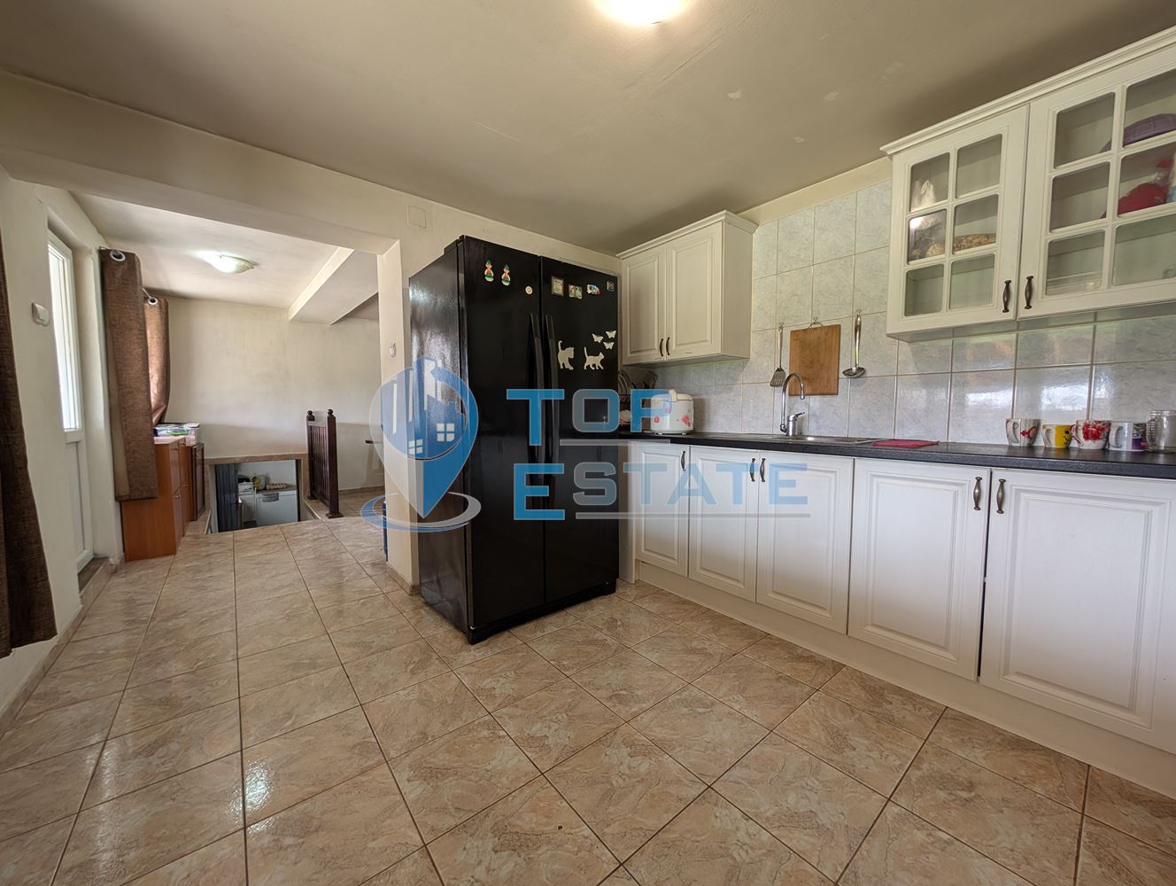 Просторна тухлена къща с кладенец и голям двор в село Раданово - 0